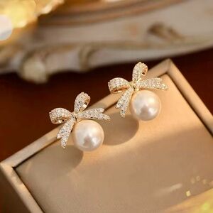 Elegant Gold Pearl Bow Earrings